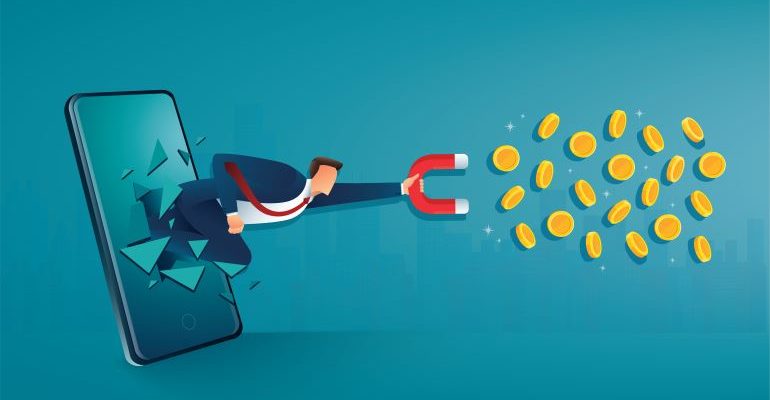 Businessman with a magnet breaking through a phone to gather coins.