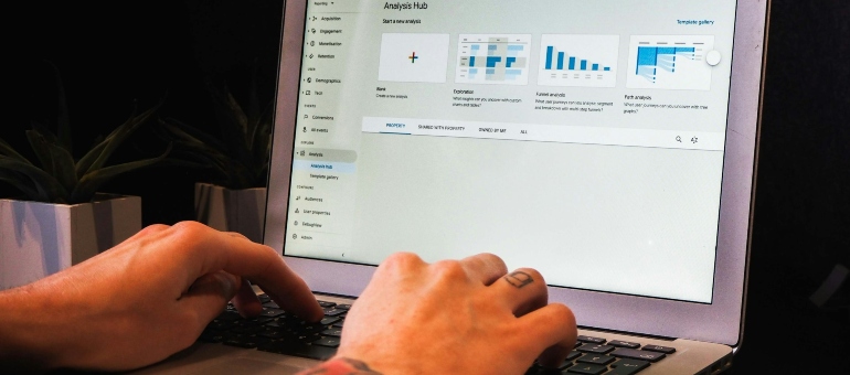 Person using Google Analytics on a laptop