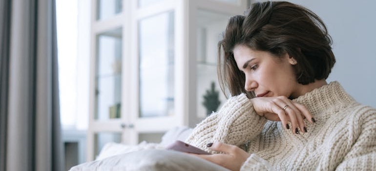 A person looking for mental health services nearby using their smartphone