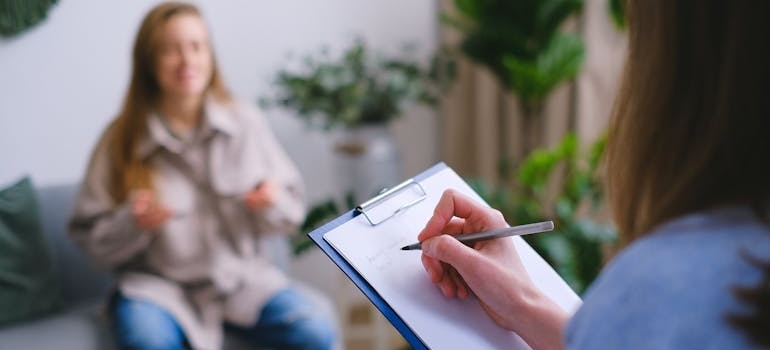 A person talking to a therapist