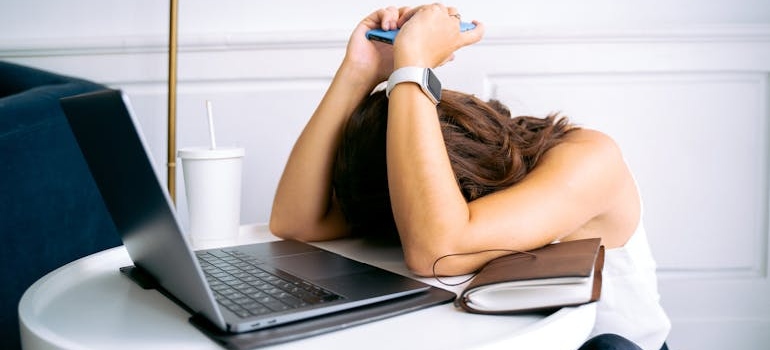 A person frustrated with a complicated website of a rehab center