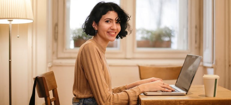 A person reading a home page, which is one of the most important pages on your therapy website