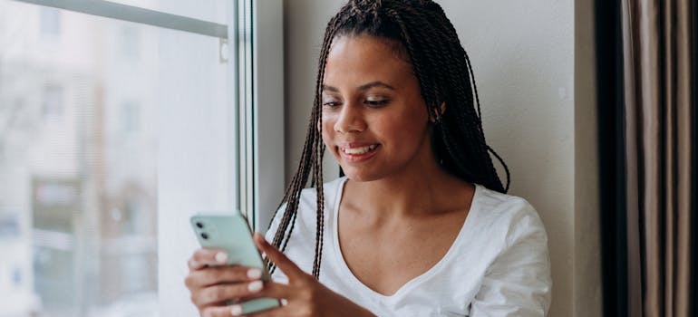 A person watching an encouraging video of a center that knows how to use video to build trust