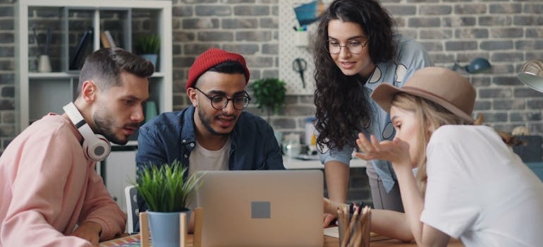 A digital marketing team discussing how to build a back-to-school campaign that supports students' mental health