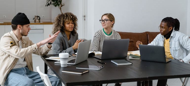 A team of digital marketing experts discussing what parents want to see on a teen mental health website