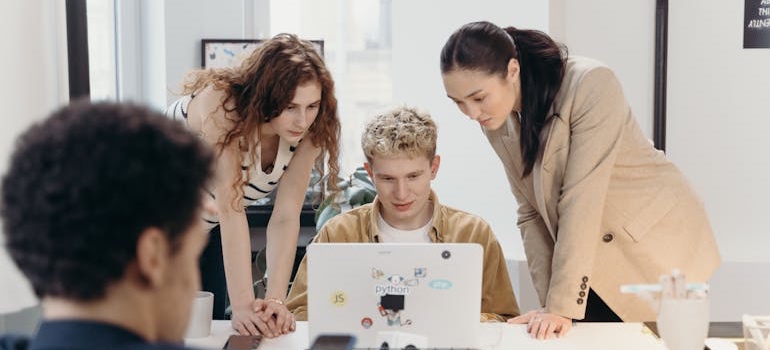 A digital marketing team doing a research on the disadvantages of running ads without fixing your website