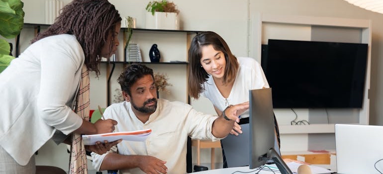 A marketing team discussing paid advertising on Facebook