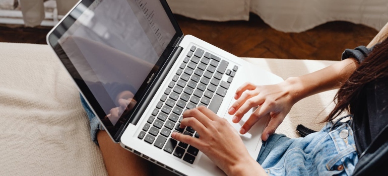a woman using her laptop