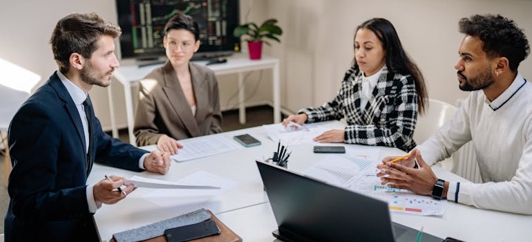 A team of marketing experts discussing the best therapist referral networks