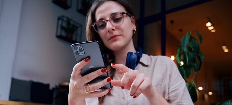 A person using a smartphone to look for aesthetic clinics