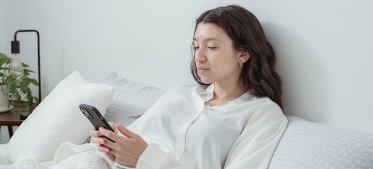A person using a smartphone to look for healthcare services