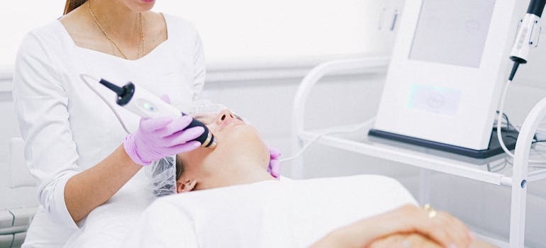 A person during a treatment at an aesthetic clinic