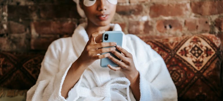 A person using a smartphone to look for aesthetic clinics