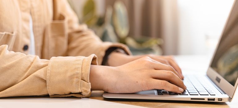 Person typing on a laptop