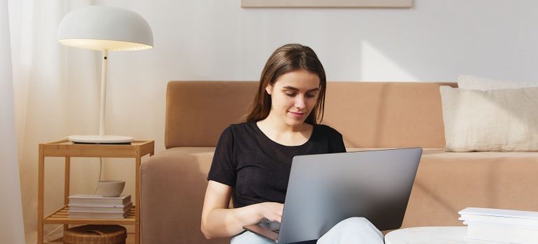 Person researching a mental health resource hub on a laptop