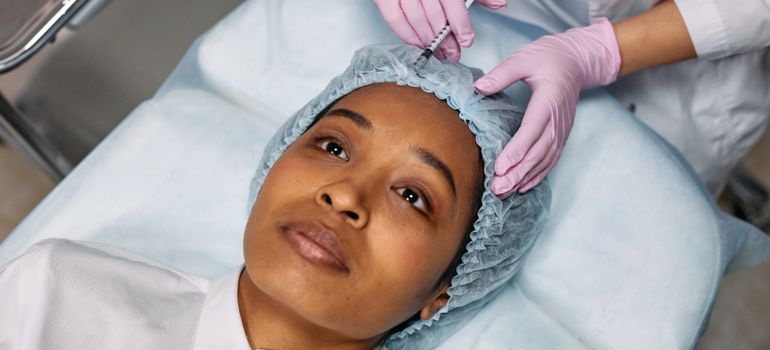 Patient receiving a Botox injection at an aesthetic clinic