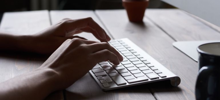 Person working on location pages for local SEO for multi-location aesthetic clinics